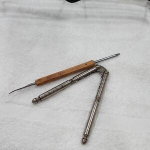 VINTAGE NUTCRACKER and NUT PICK SET